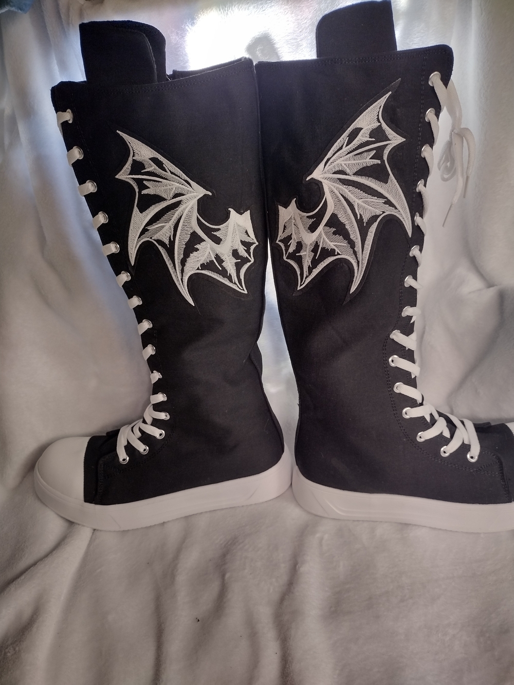 Black Lace-Up Tall Boots with White Bat Wing Embroidery